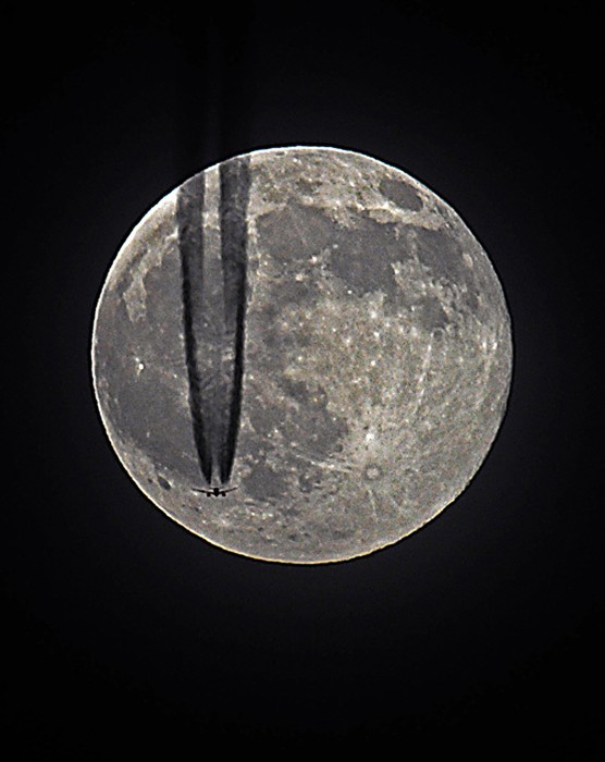 Full moon fly by