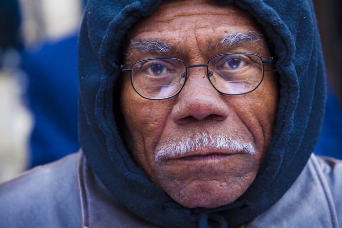 Older man in blue hoodie
